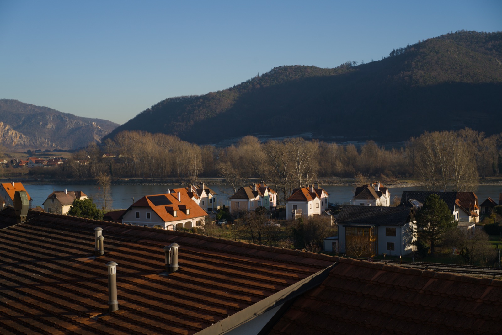 Red rooftops above a bend of the Danube in the Wachau valley